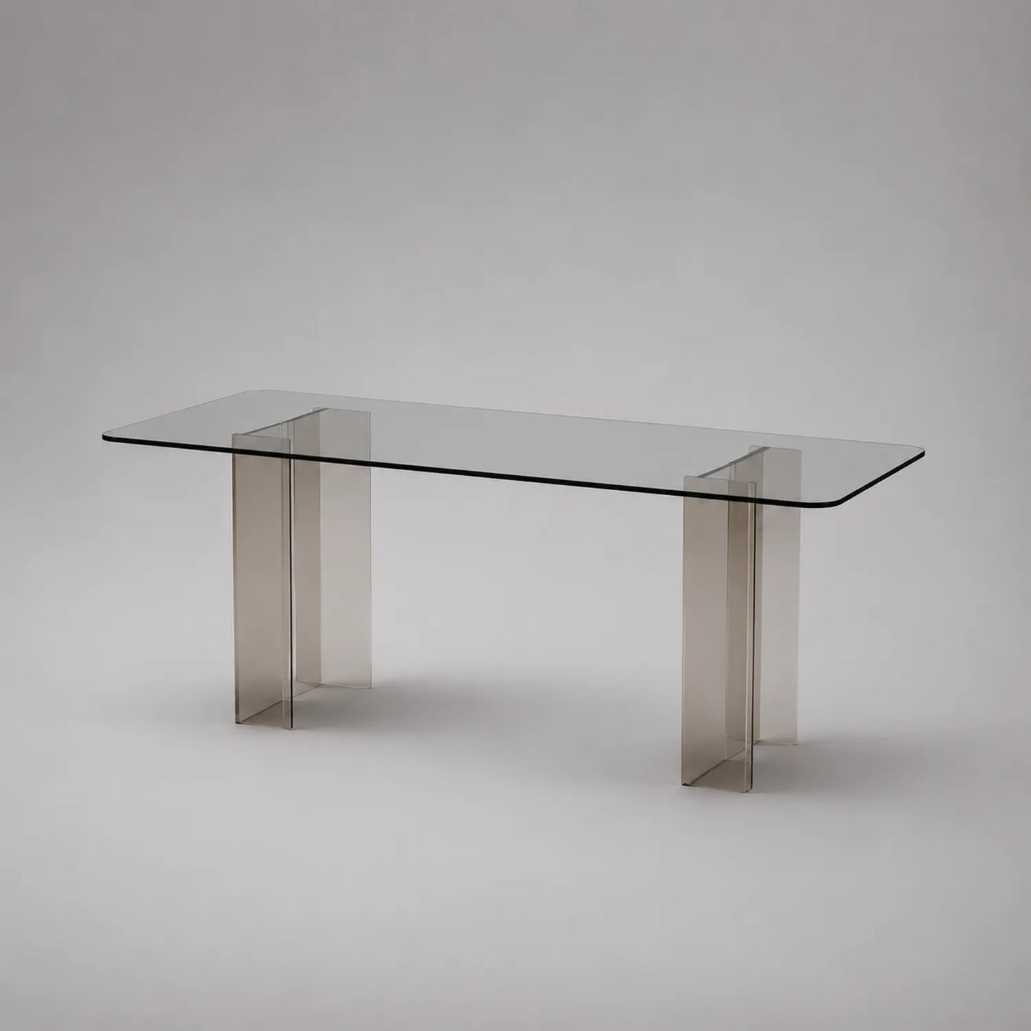 Rechteckiger Tisch aus Glas mit Acrylbeinen
